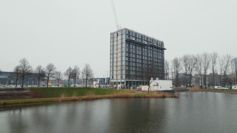construction of waterfront hotel building in rotterdam near rotterdam ahoy in the netherlands