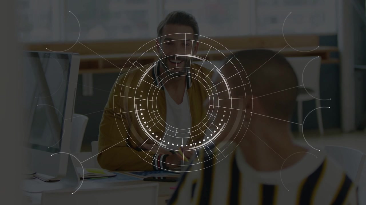 Male coworkers working at desks, circular HUD pulsing, revealing phone and monitors for business