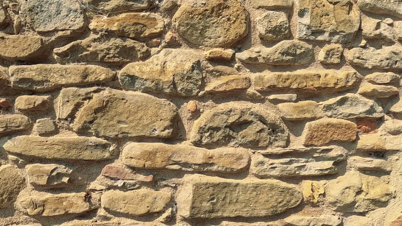 시골 의 돌 벽 의 근접적 인 모습