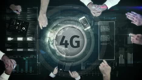 4g-logo-on-a-button-on-the-numeric-table-surrounded-by-businessmen