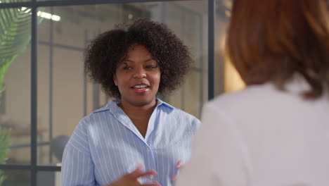 relieved woman being given all clear by doctor or oncologist at meeting in treatment clinic for breast cancer in hospital 1