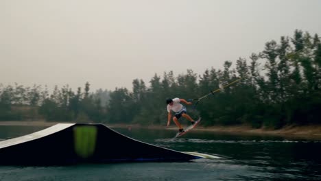 man wakeboarding in the river 4k