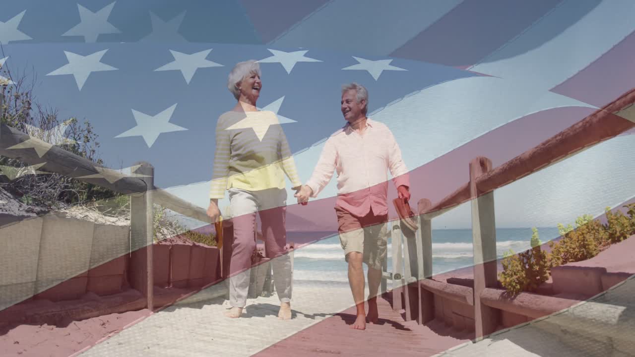 animación de una pareja caucásica de alto nivel cogida de la mano en la playa sobre la bandera de los estados unidos de américa