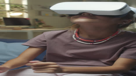 girl playing in vr at home
