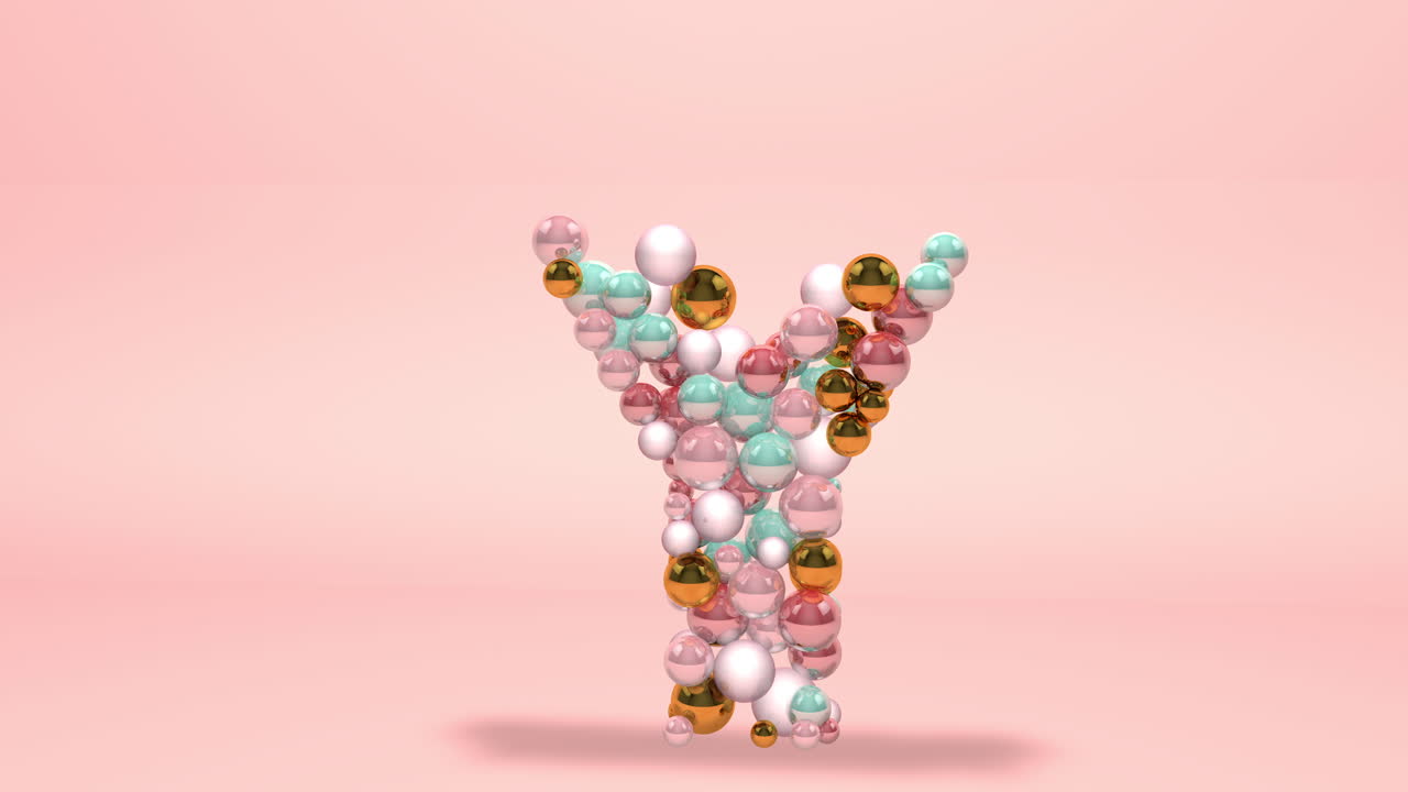 letra y hecha de cuentas, bolas de vidrio, perlas pastel, joyas de cristal y oro