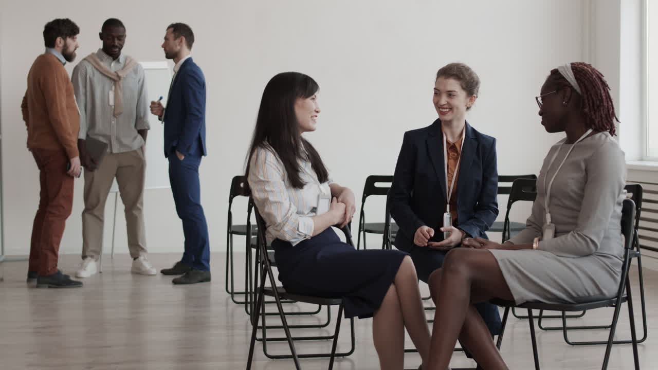 Multiethnic Female Colleagues Talking