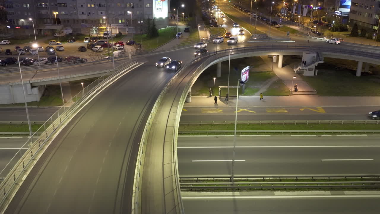 Nighttime Traffic on a Busy City Highway Interchange