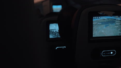 inside the airplane traveling at night