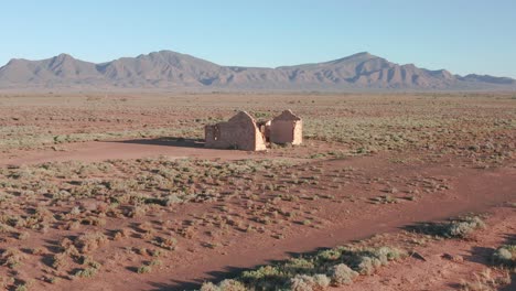 old settler ruins with flinders ranges mountains in background, south australia