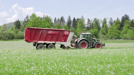 harvesting moments, hay turning with tractor