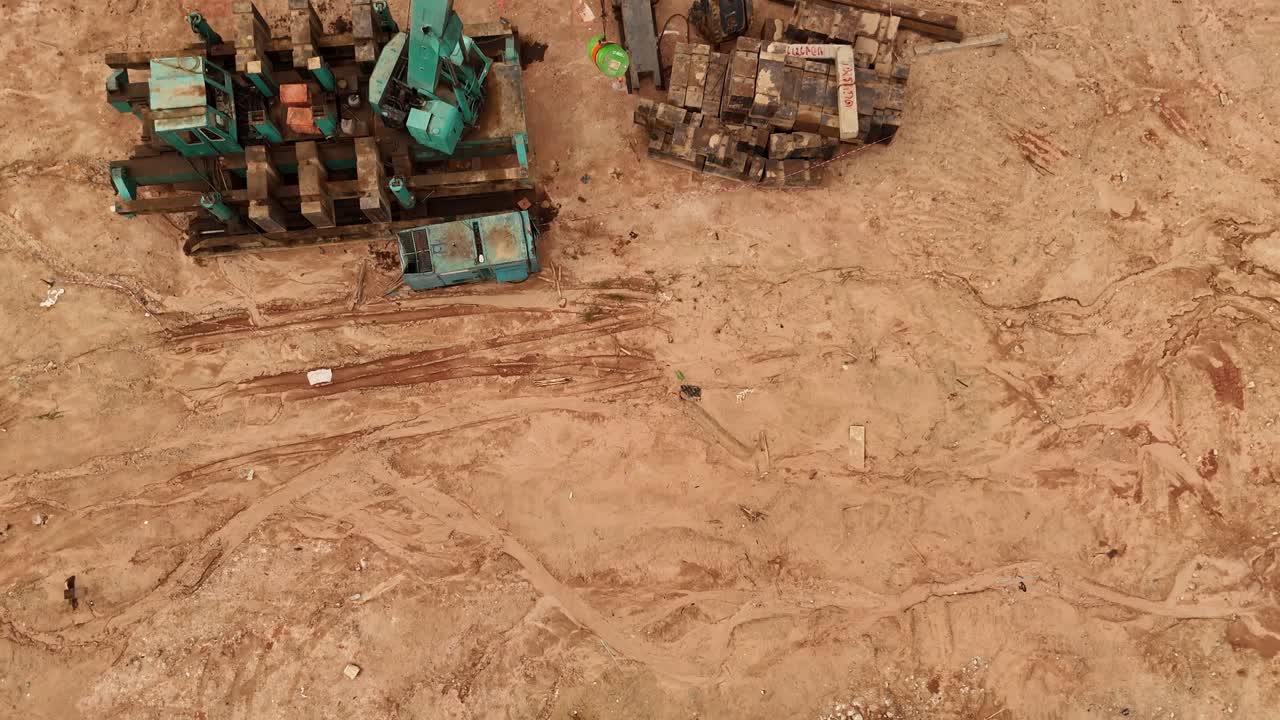 Aerial View of Construction Site with Debris and Excavation