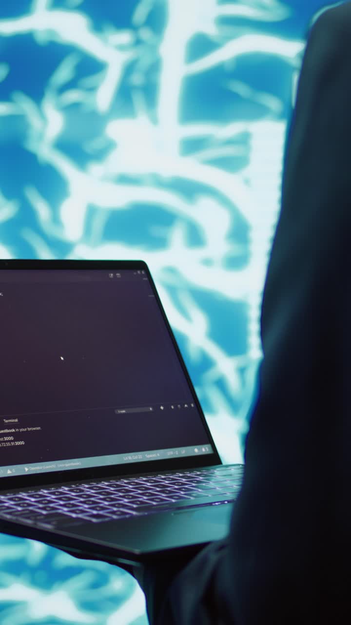 Vertical video Close up of worker using AI deep learning and laptop to look at data