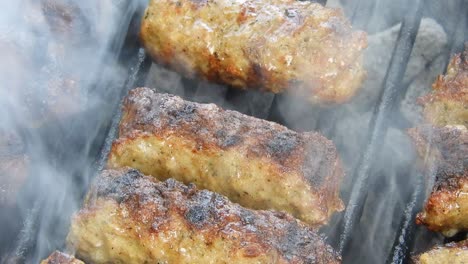 traditional food meat balls "mici" on grill