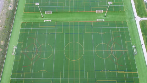 aerial view of row of turf soccer fields