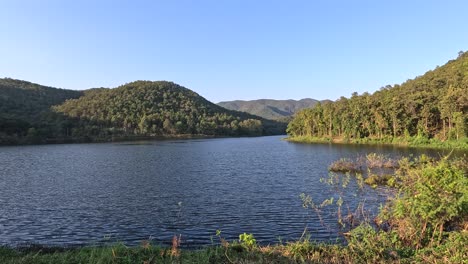 time-lapse of a tranquil mountain lake scene