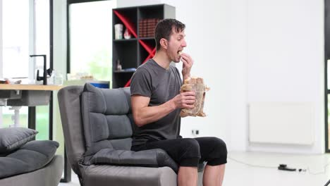 A man is eating bread