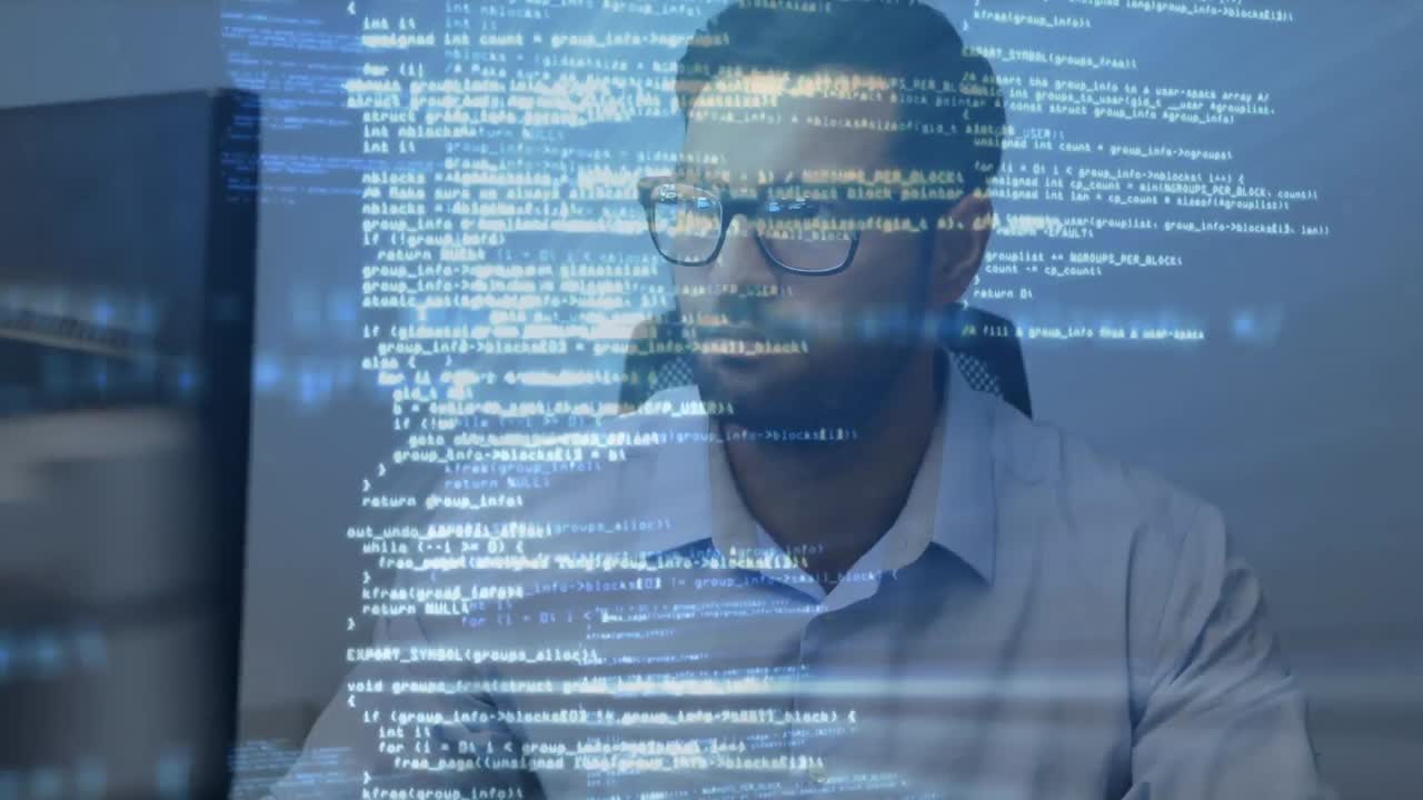 Animation of data processing against caucasian man using laptop at office