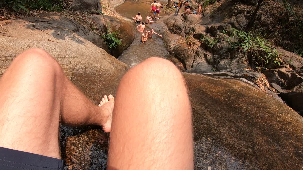 Refreshing Waterfall Swim with Friends