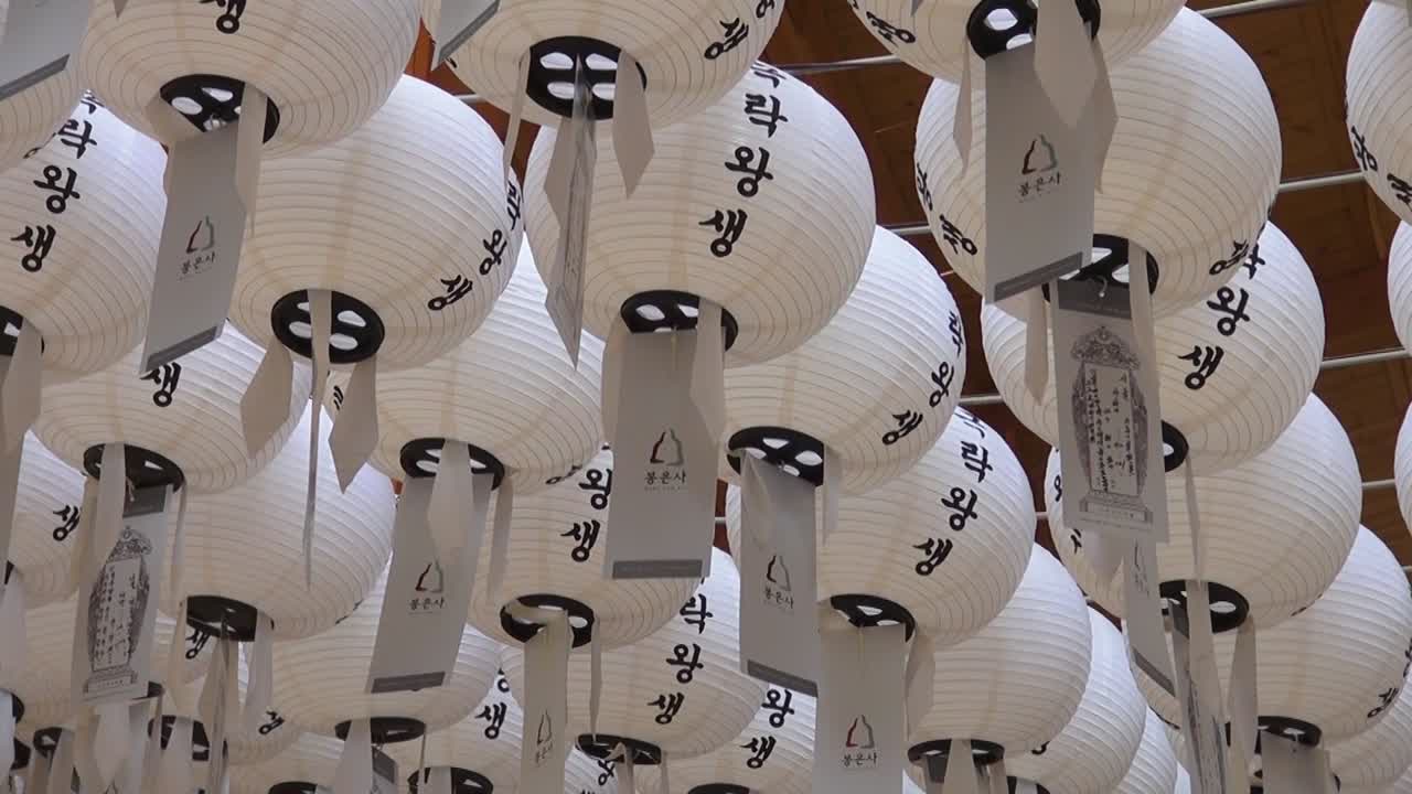 Asian lantern flowing in the wind in a Buddhist temple in Seoul, South Korea