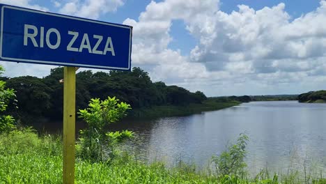 road sign of the zaza river in cuba with the zaza river in the background