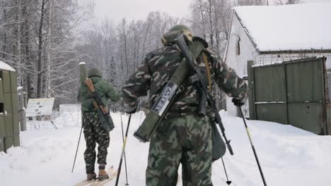 russian soldiers on skis at a checkpoint in winter