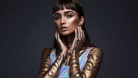 a stunning portrait of an elegantly adorned individual showcasing intricate body art, reflecting creativity and boldness with golden tattoos and unique facial accents