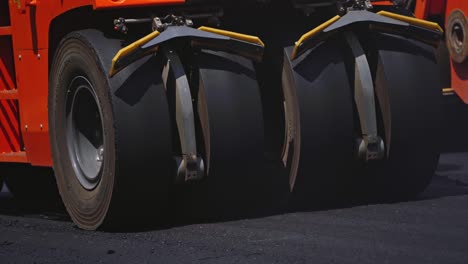 road roller doing repair of highway. road rollers working on the new road construction site