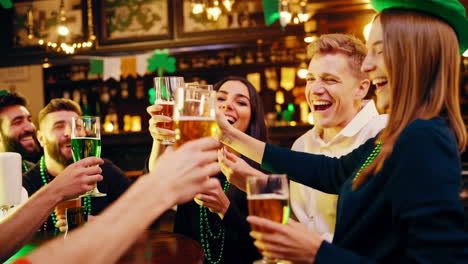 friends celebrating st. patrick's day in a bar
