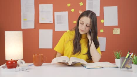 girl child reading a book.