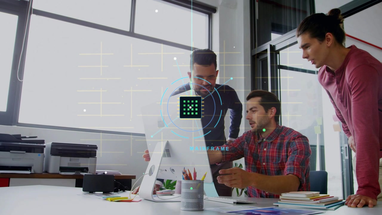 Man pointing phone, explaining tech, causing animated green grid expanding over screen guiding team