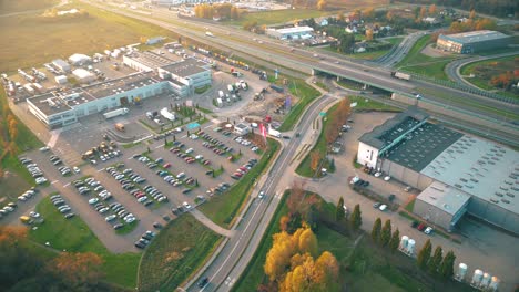 Aerial-view-of-warehouse-storages-or-industrial-factory-or-logistics-center-from-above