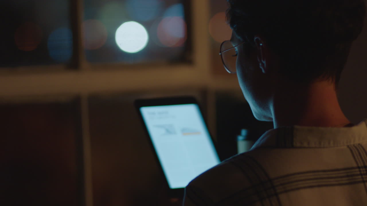 young business woman working late using tablet computer brainstorming ideas for project deadline female manager drinking coffee planning startup company development strategy in office at night
