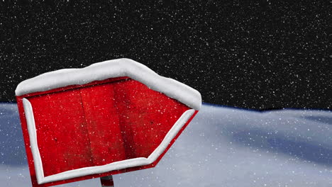 animation of snow falling over road-sign and winter landscape