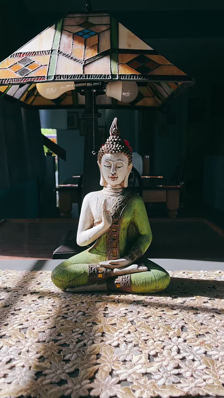Buddha Statue and Stained Glass Lamp