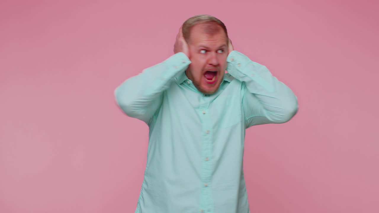 Man scared fearful, covering ears, meeting his own phobia, evidence horror event, screaming loud