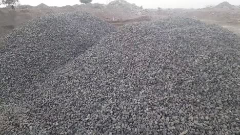 stone aggregate material for construction. crushed limestone aggregate. close up. gravel of large fractions. crushed stone, building aggregate, stone structure. pile of building material