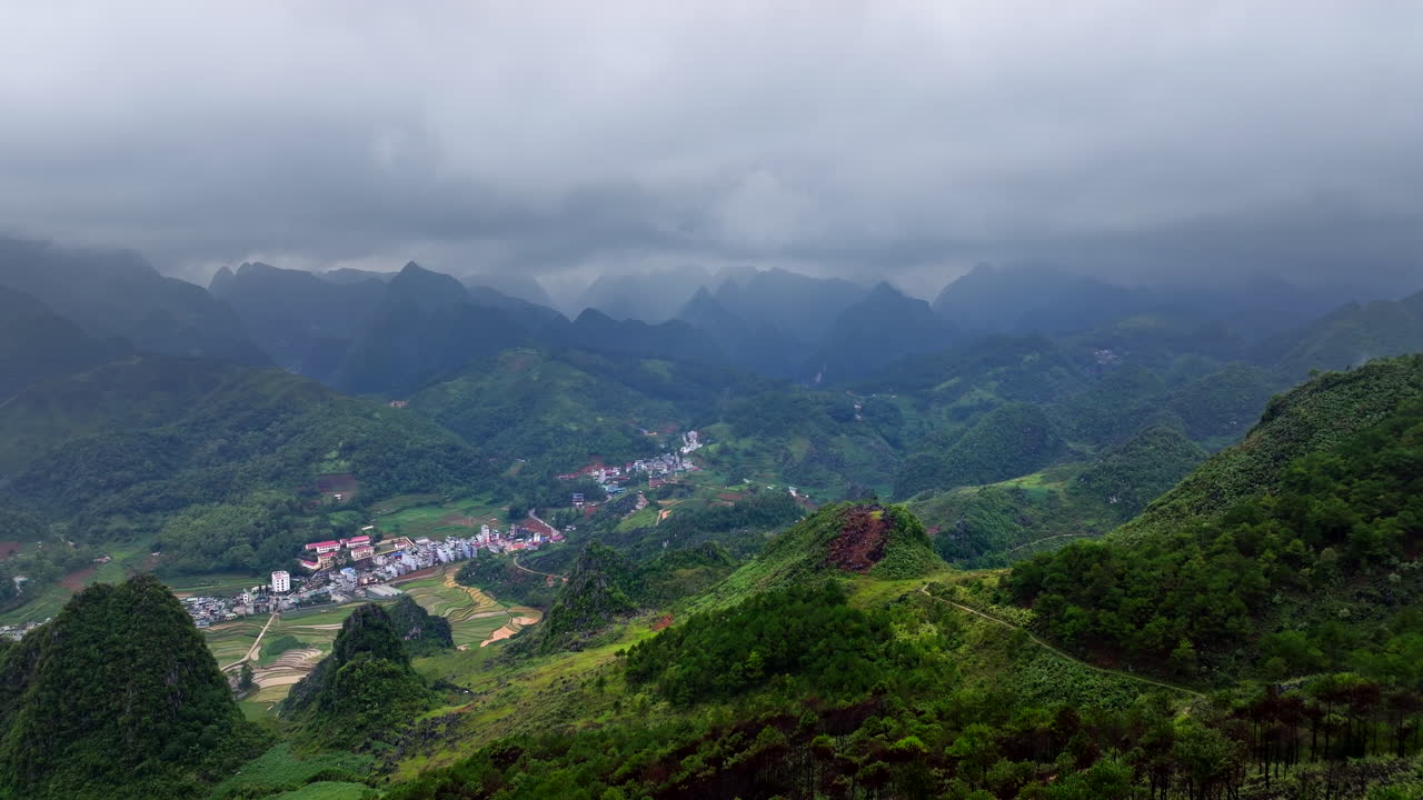 Scenic View Of Dong Van Town At Dusk In The Highland Of North Vietnam. Aerial Drone Shot