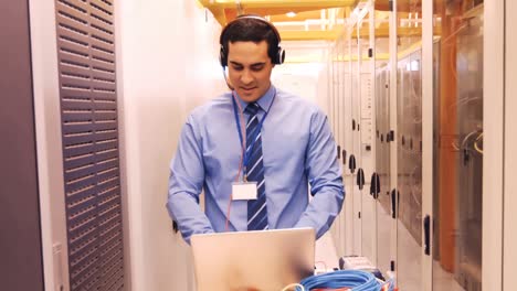 Technician-talking-on-head-phones