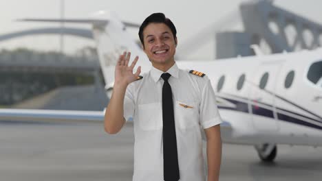 Happy-Indian-pilot-saying-hello