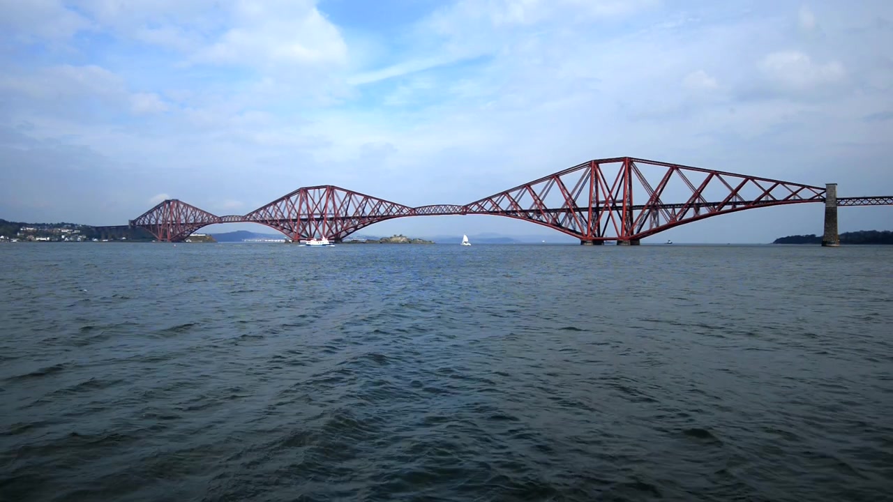 Famous Forth Bridge, with its red arches, in Edinburgh Scotland. Wide Angle shot