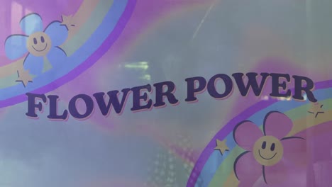 animation of flower power text with rainbow and flowers over girl holding smoke bomb