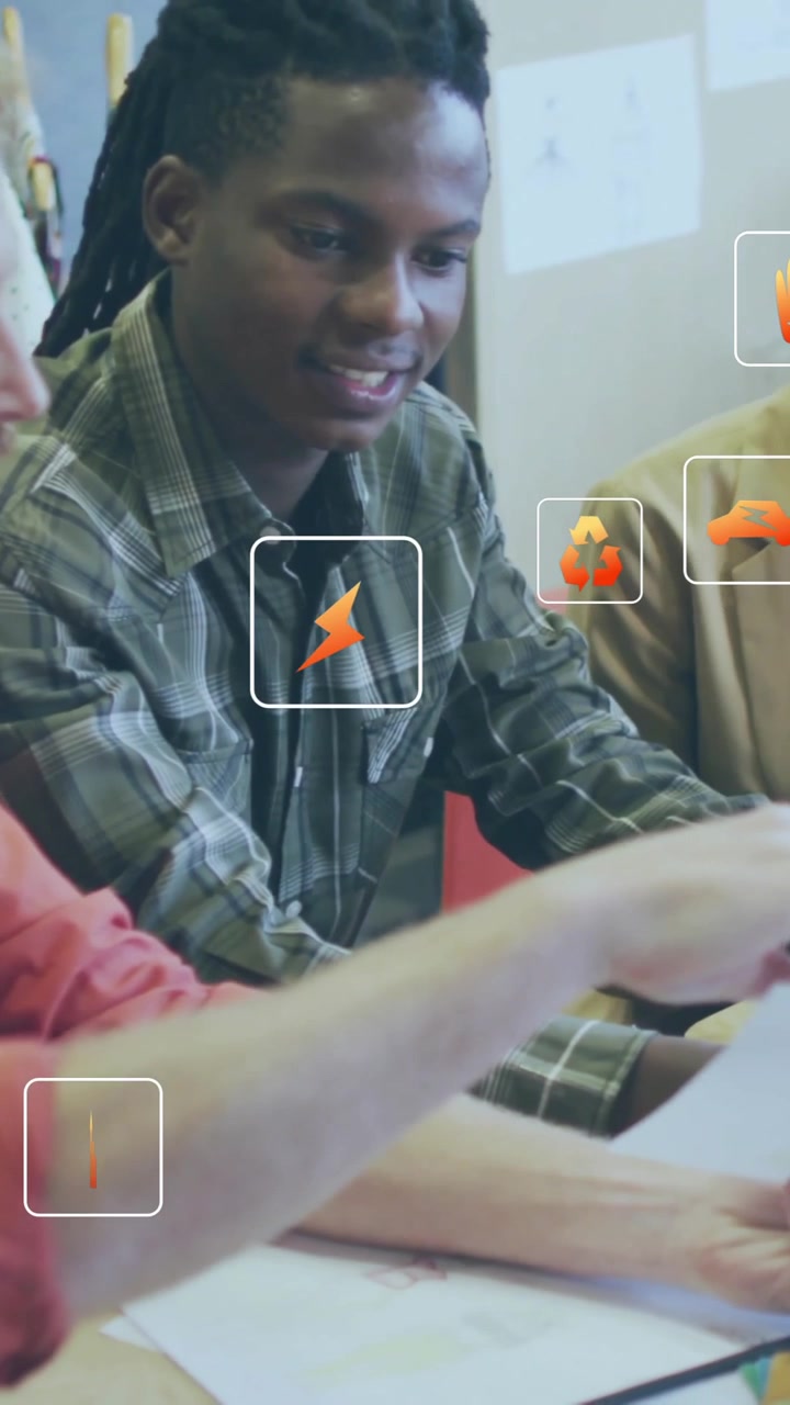 Animation of multiple icon in squares over diverse designers discussing about design in office
