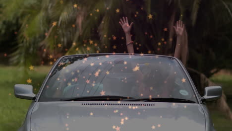 convertible car driving with star animation overlay against palm trees background