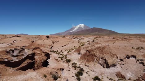 Low-flyover-rugged,-jagged-rock-landscape-on-Bolivian-high-altiplano