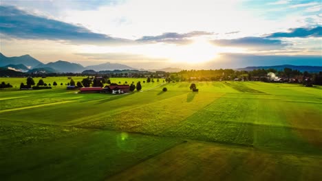 Panorama-from-the-air-sunset-Forggensee-and-Schwangau,-Germany,-Bavaria