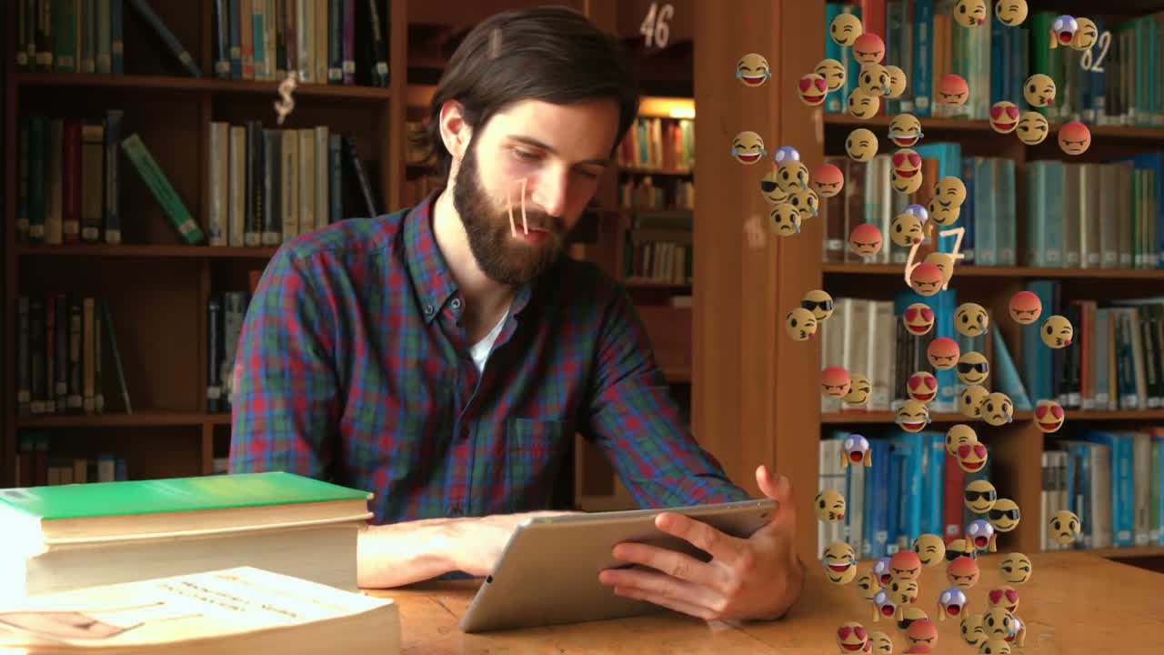 animación de emojis flotantes sobre un hombre caosiano usando una tableta en la biblioteca