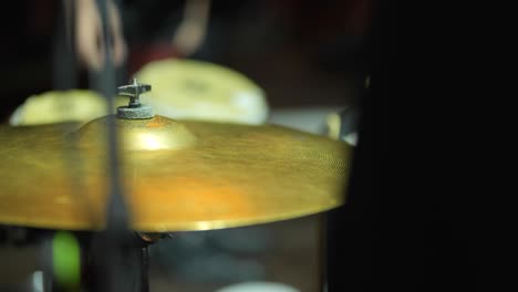 drummer playing cymbals in live concert rehearsal – slow motion close-up