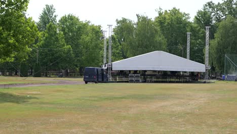 construction of outdoor concert stage tent with truss frame structure in kunfeherto, hungary