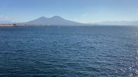 beautiful vesuvius volcano seen from the port of naples on a sunny day