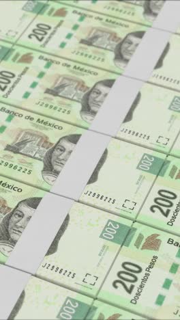 vertical video of 200 mexican pesos banknotes printing by a money press